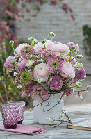 Pastel spring bouquet with ranunculus and Sea Lavender