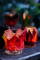 DIY candle lanterns decorated with autumn leaves