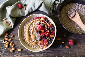 Berry buckwheat porridge with nut butter cooked in a Dutch oven