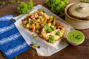 Cauliflower steaks with lukewarm potato salad