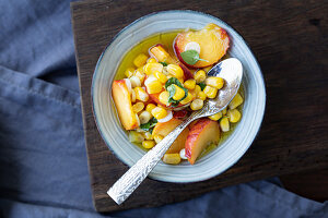 Peach and corn salsa to be served with fish
