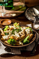 Penne pasta with gorgonzola sauce and broccoli