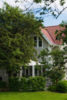View from garden to wooden house