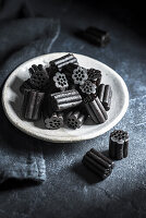 A plate of black liquorice