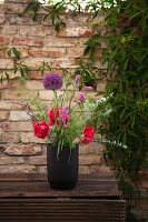 Early summer bouquet of peonies, alliums, sea lavender, love-in-a-mist and eucalyptus