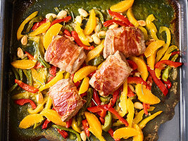 Spanish baked lamb with bell peppers from the tray