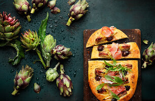 Artichoke and olive focaccia with rocket and Parma ham