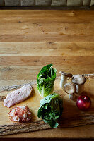 Ingredients for duck breast with mushrooms and an apple-and-cos-lettuce salad