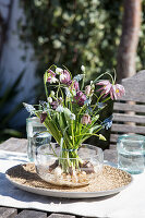 Bouquet of snake's head fritillaries, grape hyacinths and snowdrops