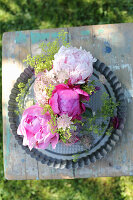 Peonies in cups