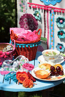 Screen with lace blankets, borders, crochet flowers and pompoms