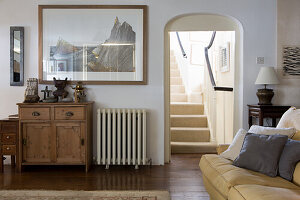 Rural living room with view of the staircase