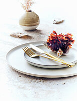 A place setting decorated with seaweed