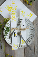 Invitation card and place card with flower print from tansy (Tanacetum vulgare)