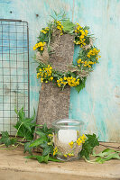 Wreath made of tansy (Tanacetum vulgare), hops (Humulus), blackberry leaves (Rubus) and sack ribbon