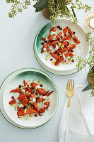 Roasted carrot salad with pomegranate seeds and pistachios