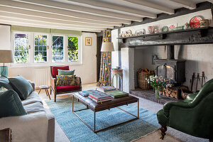 Rural living room with fireplace and vintage seating furniture