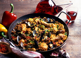 Traditional paella with poultry and mussels (Spain)
