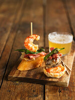 Prawns and peppers with beer glass