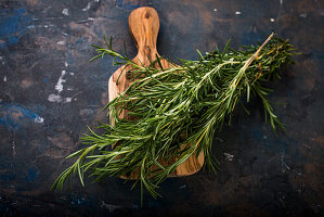 Fresh rosemary on a wooden board