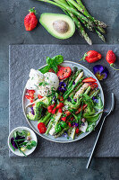 Asparagus salad with strawberries and burrata