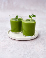 Green apple smoothie with kiwi, banana, cucumber and spinach