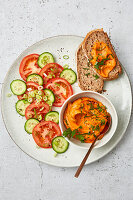 Red lentil spread with tomatoes and cucumber