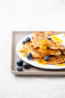 Blueberry pancakes with sea buckthorn sauce