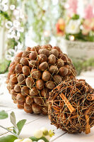 DIY Christmas balls made from spices and hazelnuts