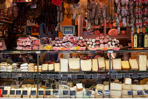 Market stall with sausage and cheese (Bolzano, Italy)