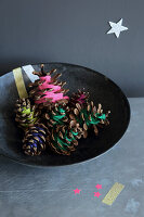 Cones decorated with colorful wool scraps