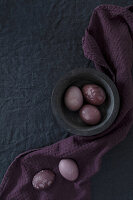 Easter eggs coloured with elderberry juice