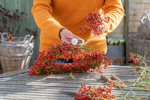 Heart of rose hips on a bent wire wreath blank