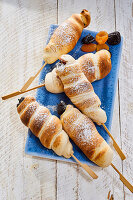 Sweet bread with dried fruits on a stick