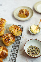 Savoury Hot Cross Buns made with Cheddar and Parmesan and sprinkled with All Bagel Seasoning