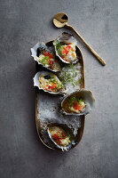 Oysters with crab and fennel salad and finger limes