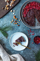 Chocolate nut cake with pomegranate seeds