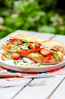Baguettes with peppers and hummus