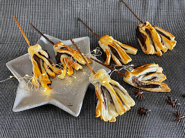 Chocolate brooms made from puff pastry for Halloween