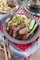 Roast duck breast with pasta and cucumber
