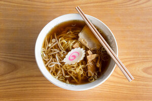 Soba noodle soup with fish pie, tofu and nigiri