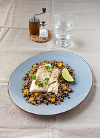 Rice and lentil pan with cod