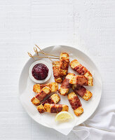 Haloumi sticks wrapped in ham