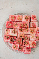 Cube-shaped cut-out cores of red-fleshed apples