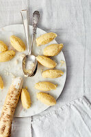 Vegan semolina dumplings with horseradish