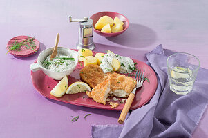 Wholemeal baked fish with herb dip