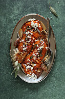 Honey-glazed Hasselback butternut squash with feta and seeds