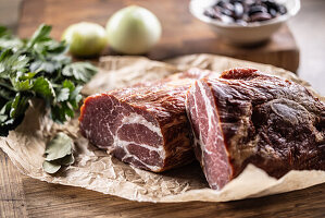 Smoked pork neck cut into two pieces