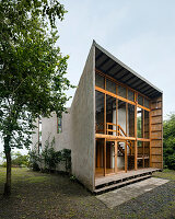 House with modern timber and concrete façade in a rural setting