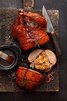 Glazed roll roast of farm duck with Christmas stollen filling